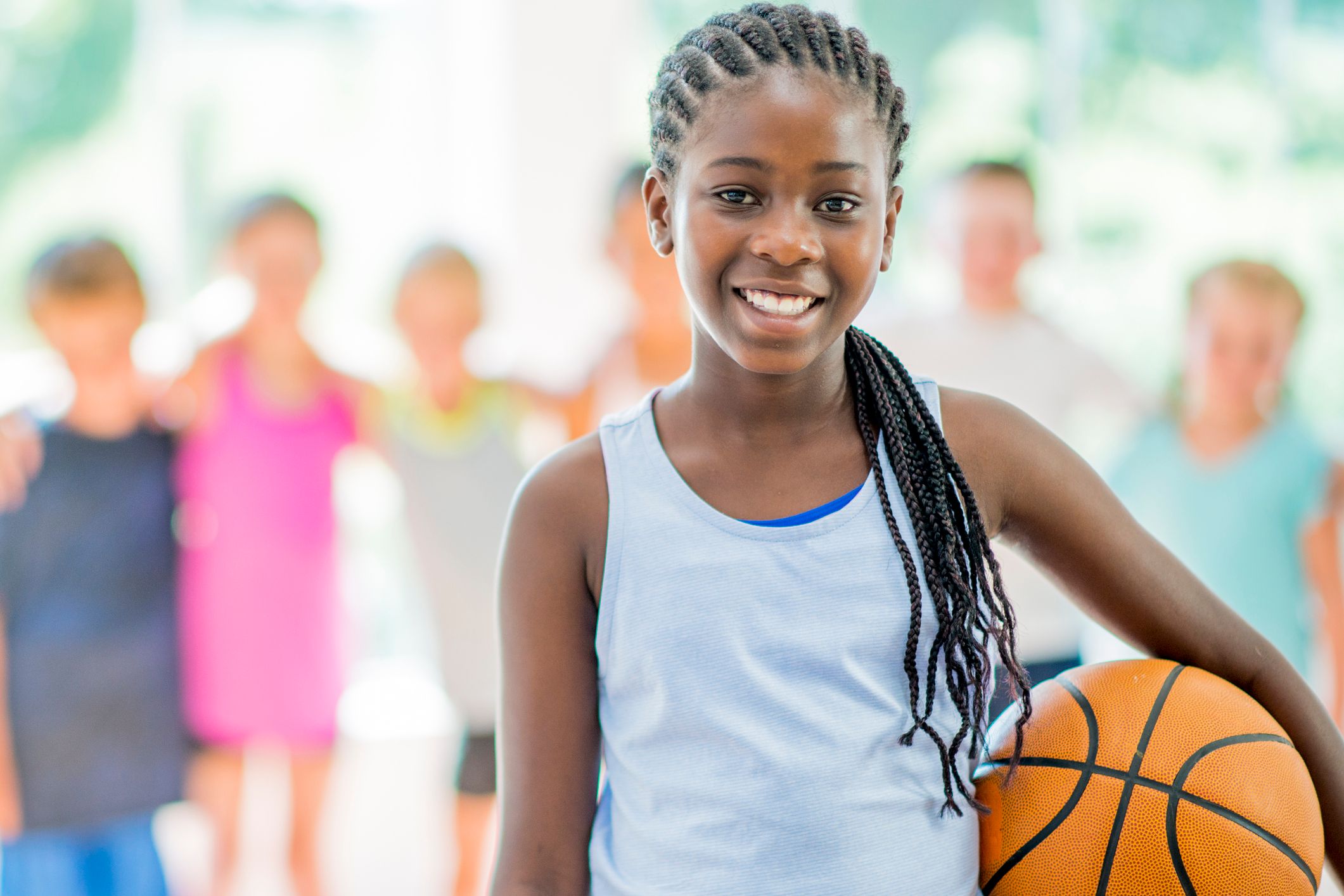 Student holding basketball